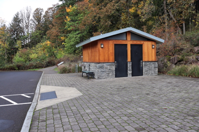 Mather Road from parking lot, crosswalk and curb cut – unisex restrooms – interpretive displays – drinking fountain – trailhead